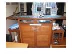 Drinks Bar 6ft long dark wood with 2 matching stools....